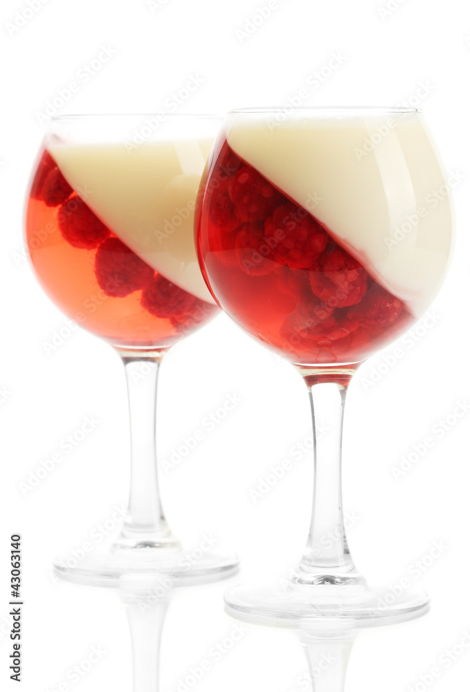 fruit jelly with raspberries in glasses isolated on white
