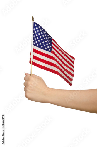 Hand holding american flag on white © Elnur