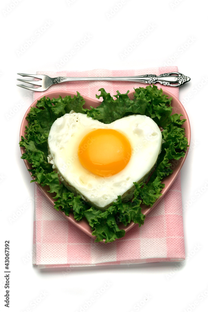 Sandwich with fired egg sunny side up, heart shaped Sandwich with fired egg sunny side up, heart shaped