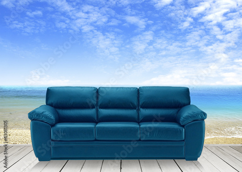 Wooden terrace and blue sofa © basketman23