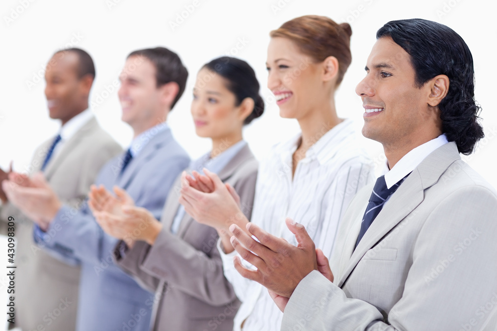 Close-up of happy business people applauding Close-up of happy business people applauding