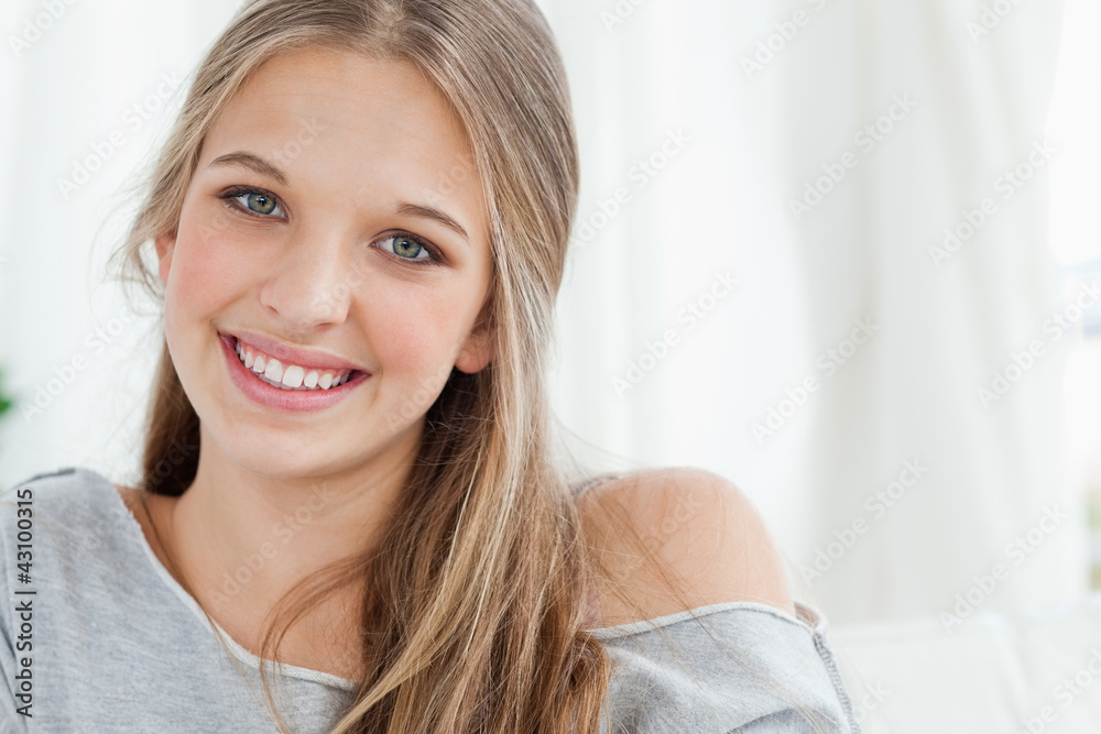 Close up of smiling girl looking at the camera Close up of smiling girl looking at the camera