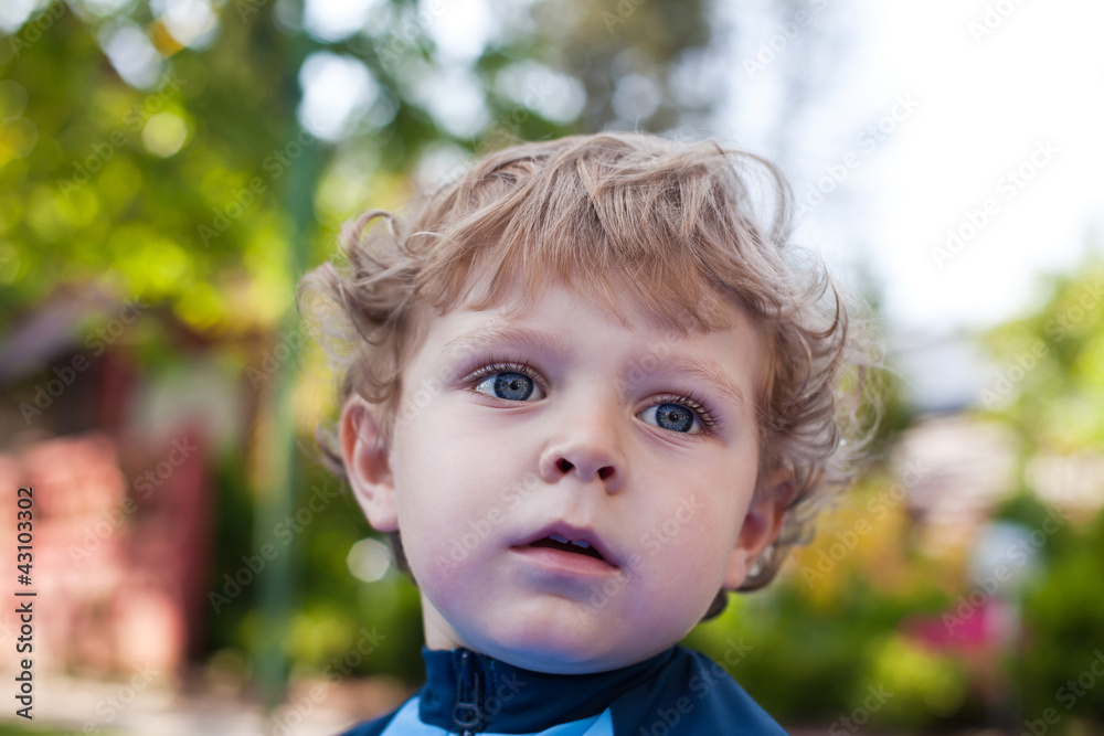 adorable baby boy with blond hairs and blue eyes adorable baby boy with blond hairs and blue eyes