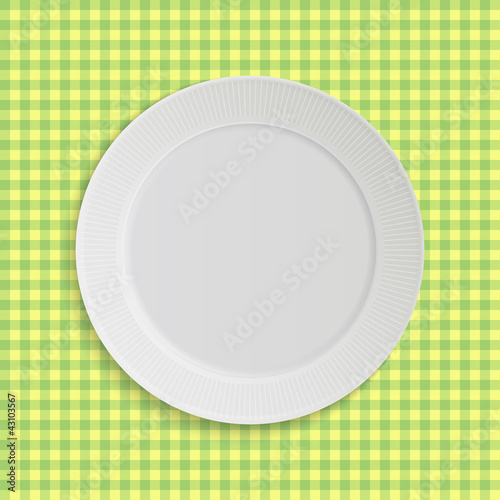 Vector plate on tablecloth