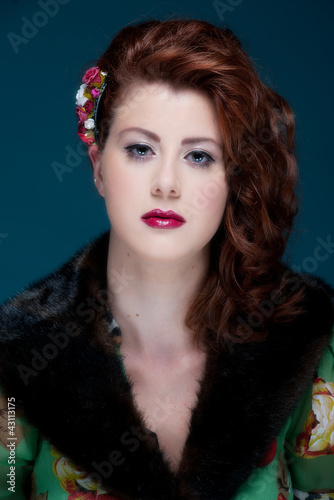 Fototapeta Naklejka Na Ścianę i Meble -  Beaytuful young female with retro look and makeup