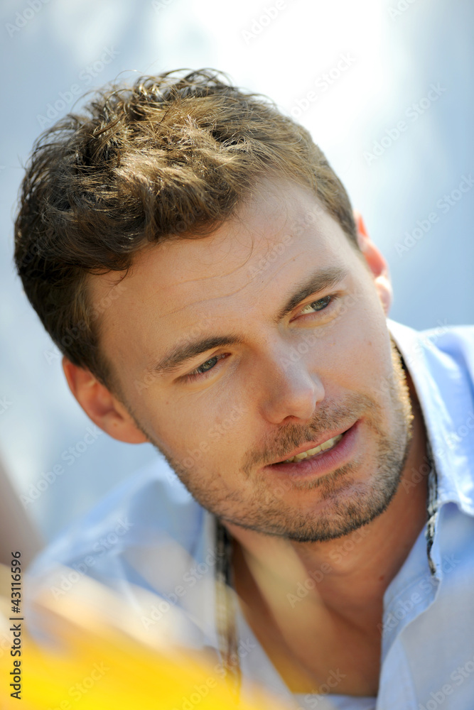 Obraz premium Closeup of handsome blond guy on a date