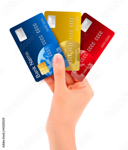 Male hand showing credit cards