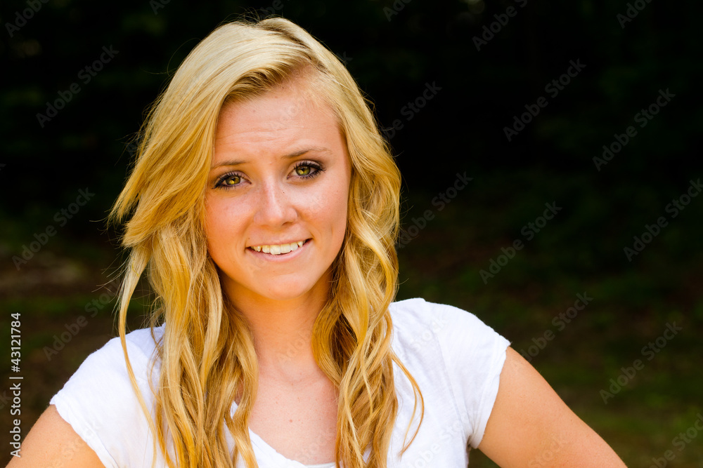 Summer portrait of happy smiling pretty teenage girl outdoors Summer portrait of happy smiling pretty teenage girl outdoors