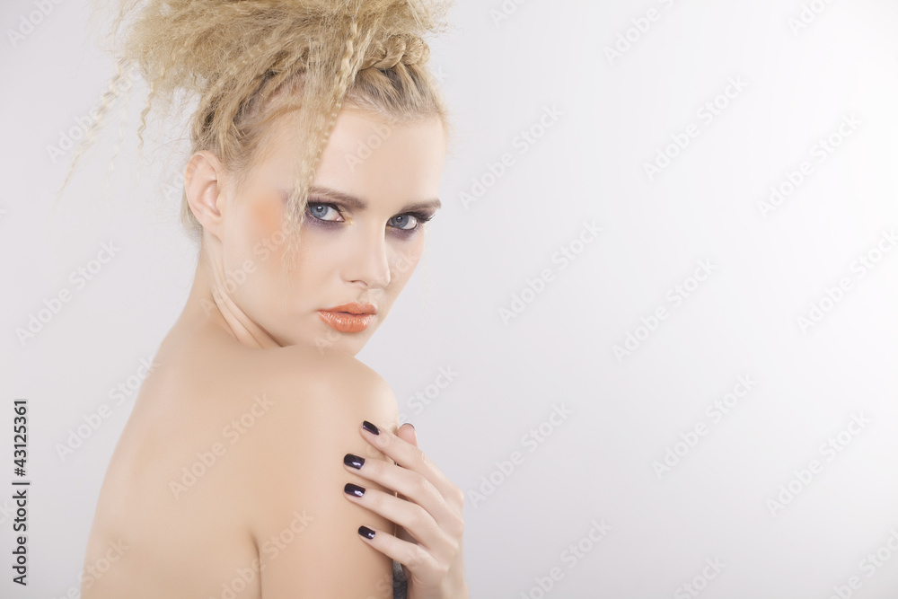 Naklejka premium Young pretty woman with beautiful blond hairs