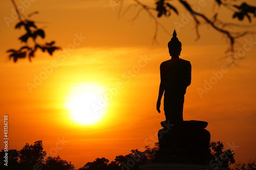 buddha statue of sunset in thailand