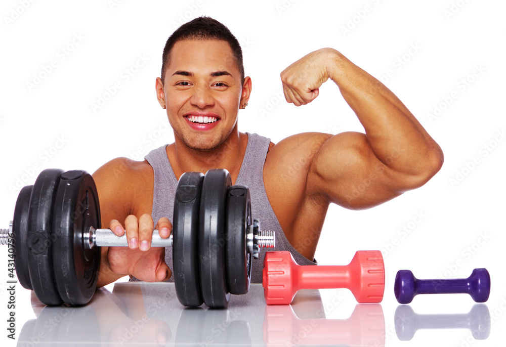 Portrait of muscle man posing in studio with dumbbells Portrait of muscle man posing in studio with dumbbells