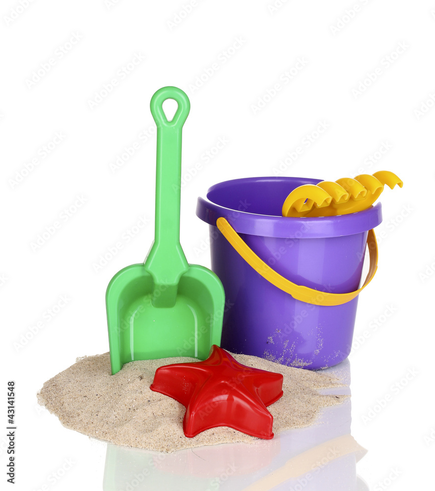 Children's beach toys and sand isolated on white Children's beach toys and sand isolated on white