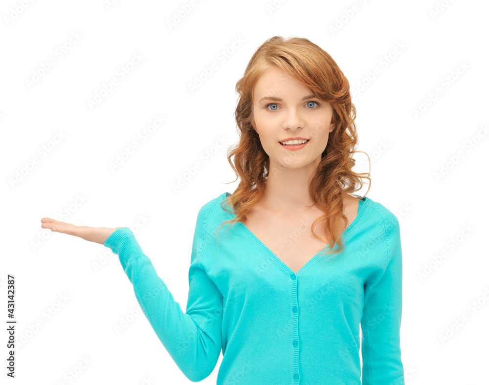girl showing something on the palm of her hand girl showing something on the palm of her hand