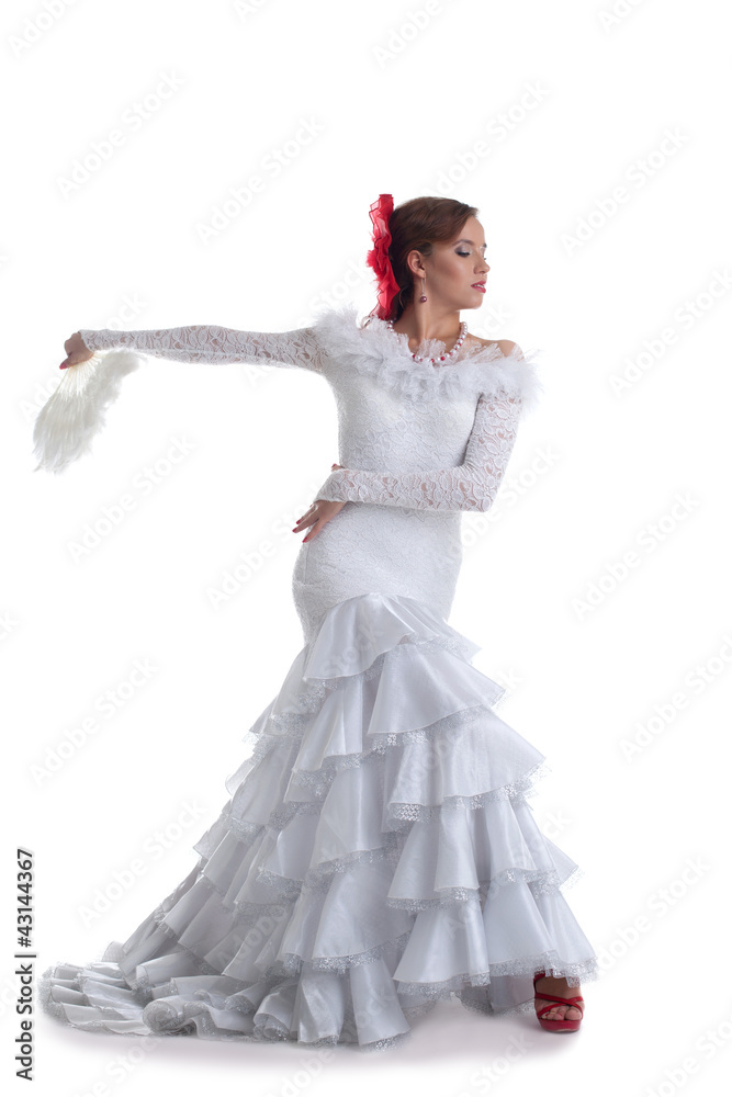 Woman in white dress performing flamenco Woman in white dress performing flamenco