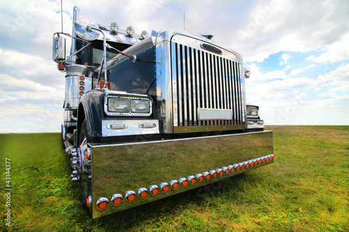 American truck in field photo