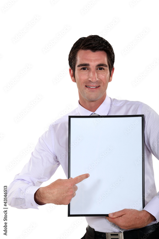 Man holding up a blank bulletin board Man holding up a blank bulletin board