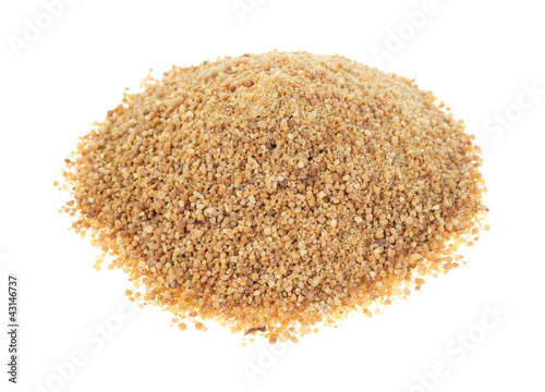 Coconut palm sugar on white background