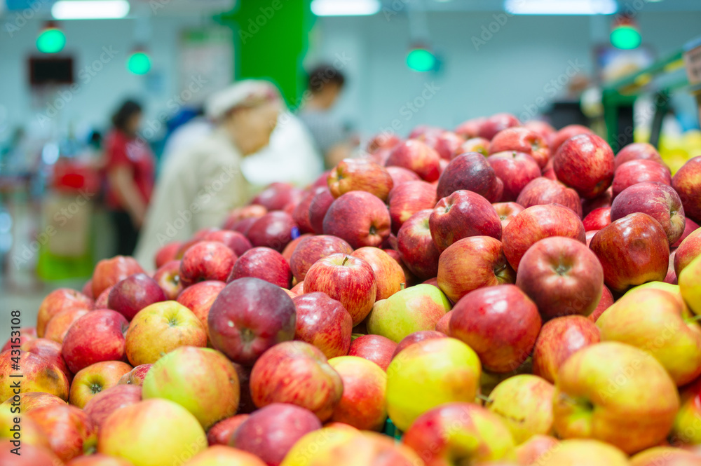 bunch of fresh red apples in supermarket bunch of fresh red apples in supermarket