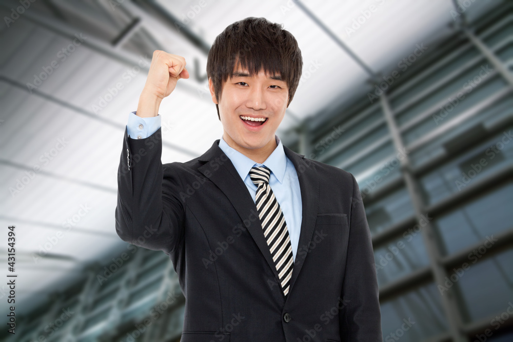 Happy young Asian business man Happy young Asian business man