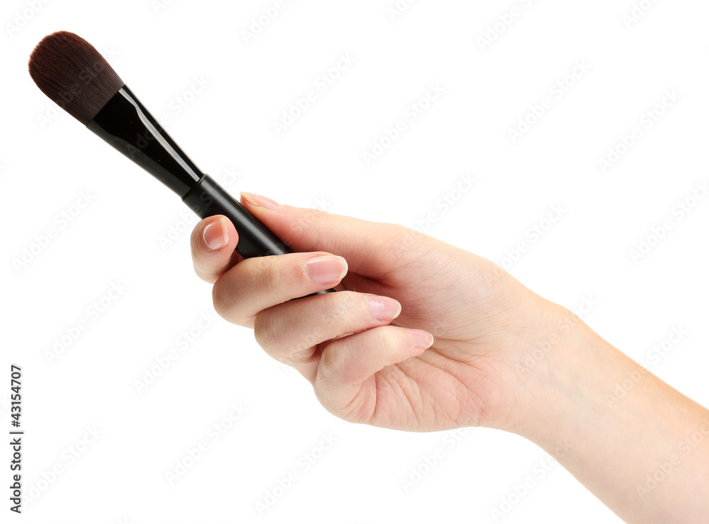 hand with black brush for make-up isolated on white. hand with black brush for make-up isolated on white.