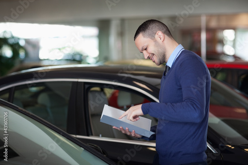 Man reading a file © WavebreakmediaMicro