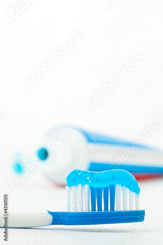Fototapeta Naklejka Na Ścianę i Meble -  Toothpaste next to a toothbrush