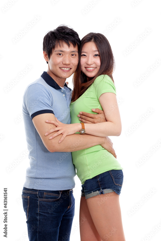 Happy young Asian couple isolated on white background. Happy young Asian couple isolated on white background.