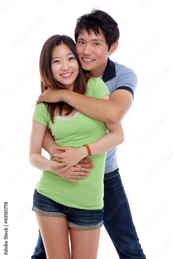 Happy young Asian couple isolated on white background. Happy young Asian couple isolated on white background.