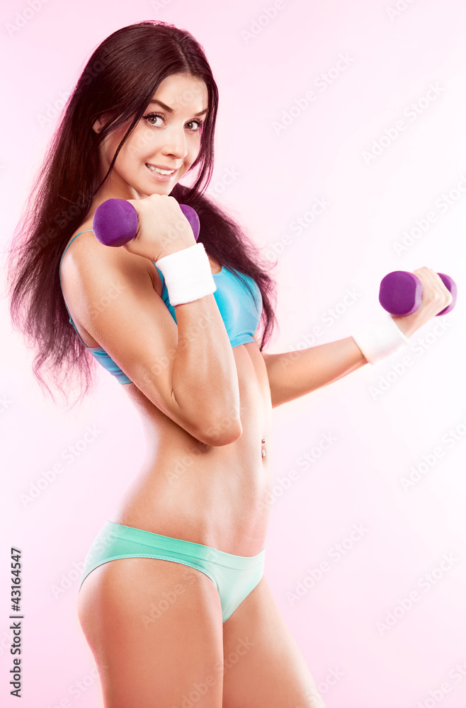 woman with dumbbells