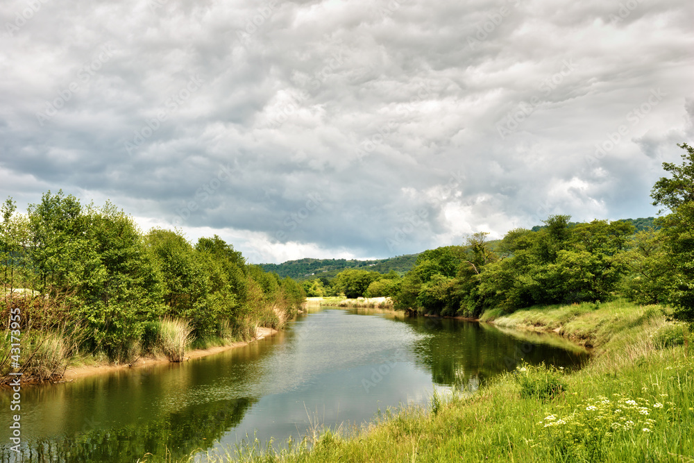 River Leven flowing through lush countryside