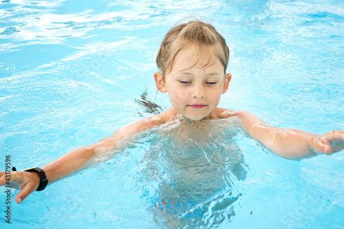 girl swim in the pool