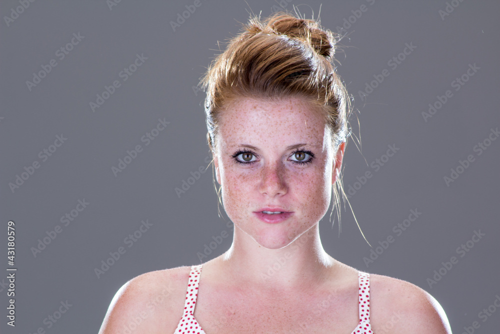 Beautiful smiling girl at home, with sensual gaze