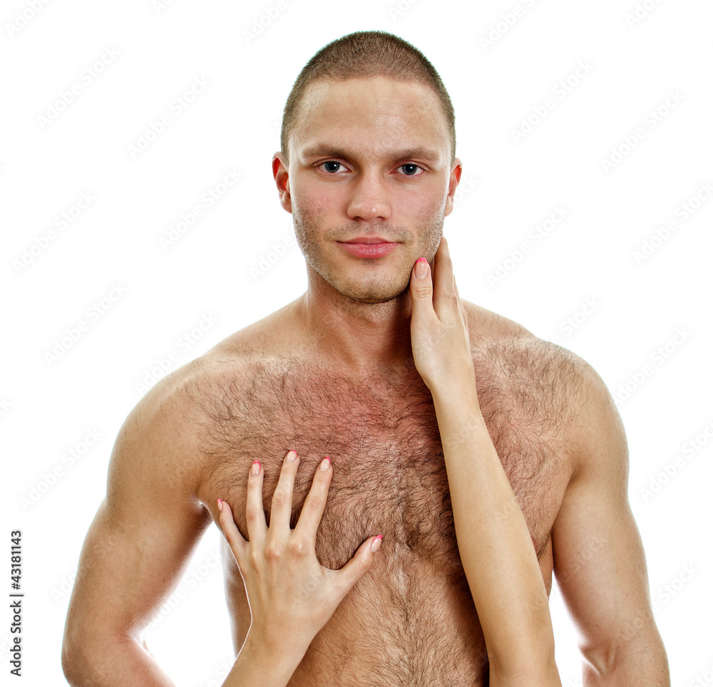 Obraz premium Woman's hands touching man's chest. Isolated on white.