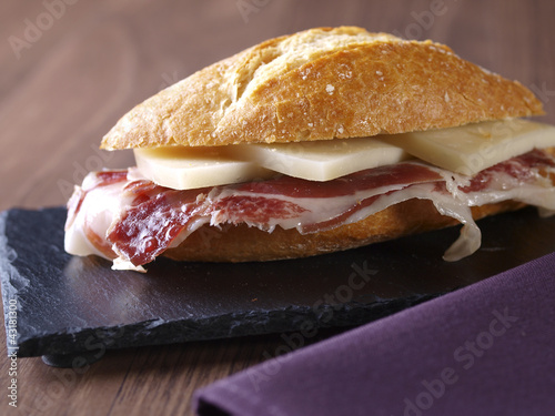 Cured ham and cheese sandwich.