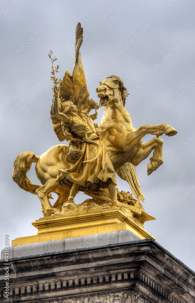 golden statue on Pont Alexandre Bridge, Paris, France