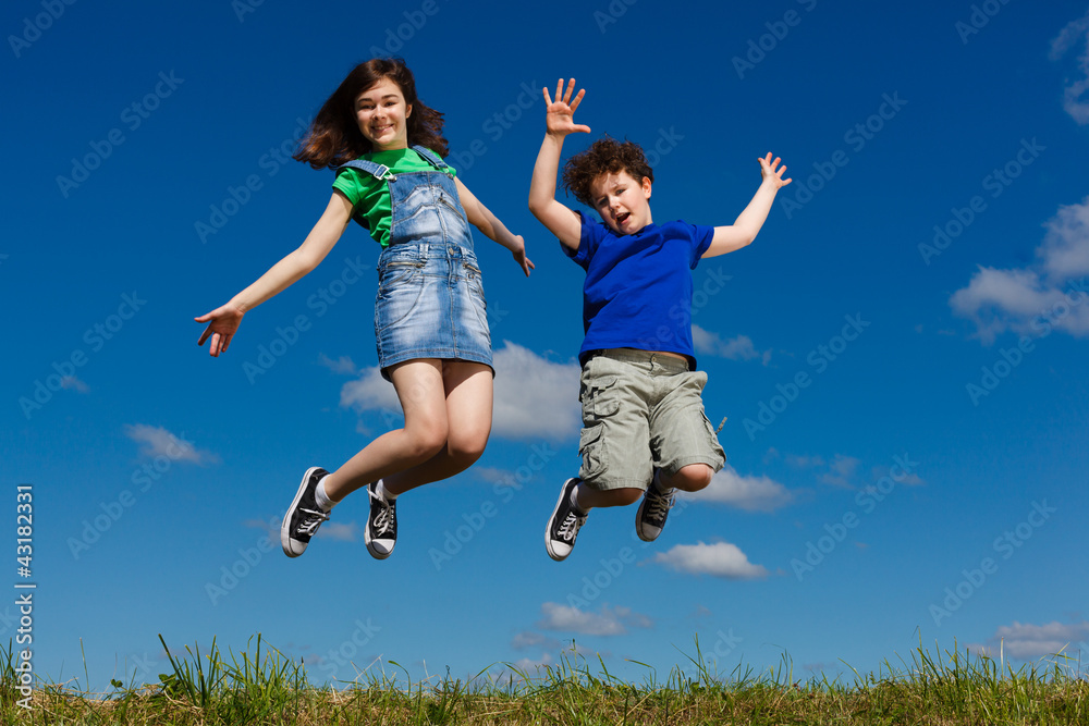 Girl and boy running, jumping outdoor Girl and boy running, jumping outdoor