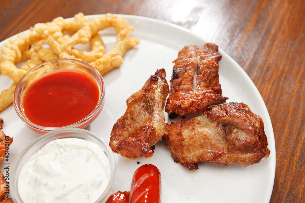 Appetizer plate with dipping sauces Appetizer plate with dipping sauces