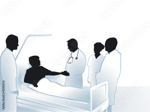 Ärzte und Pfleger mit Patient im Krankenhaus