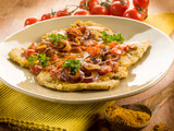 escalope with curry onions and tomatoes