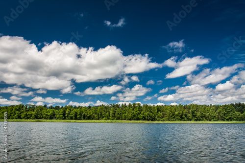 Blue sky with clouds at the...