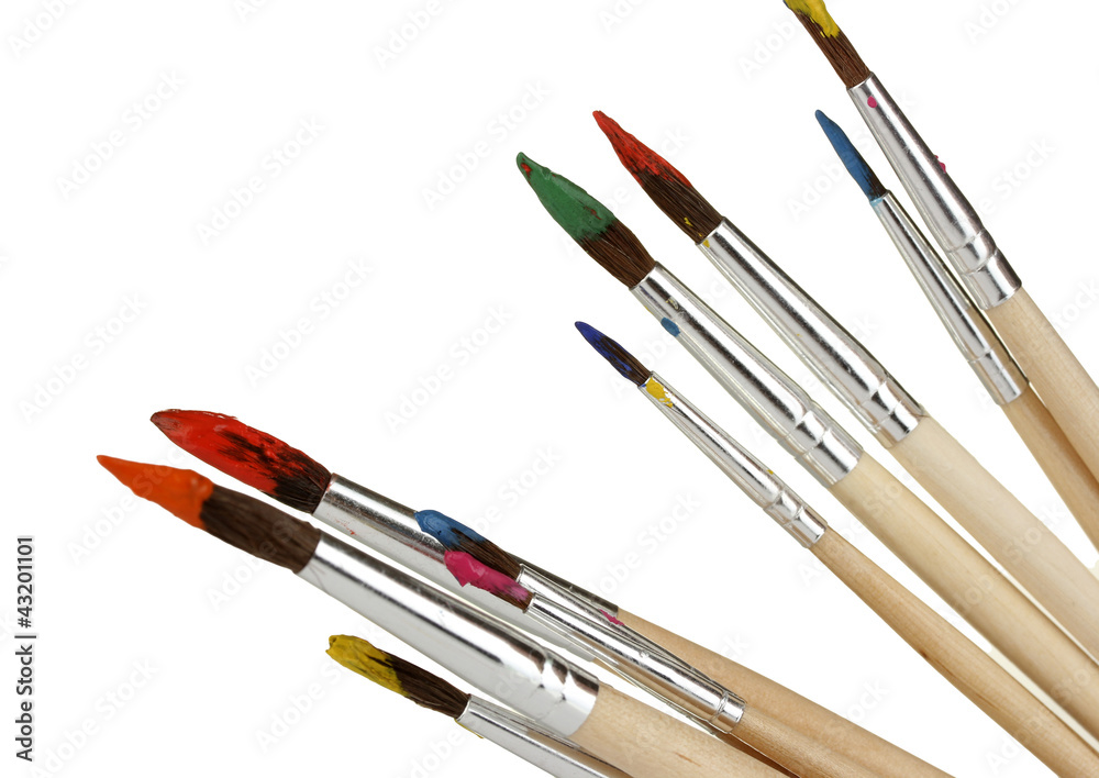 Paint brushes with gouache isolated on white