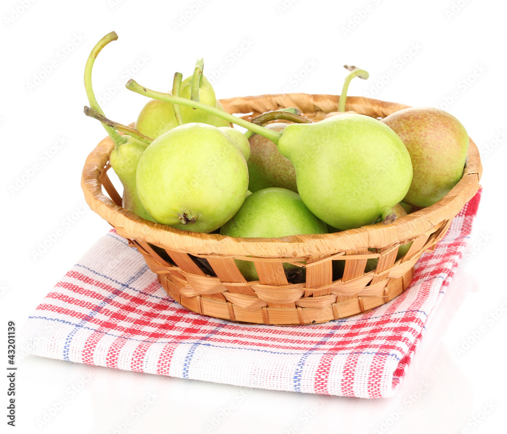 ripe pears in basket isolated on white.