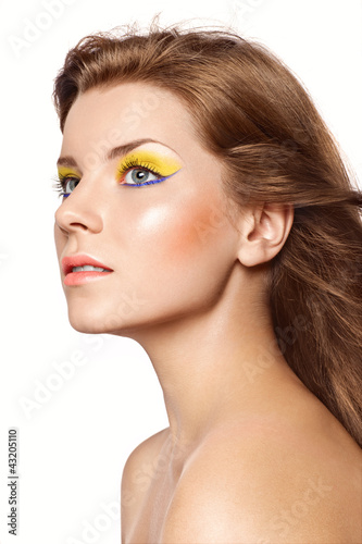 beautiful girl with a bright lemon-colored make-up