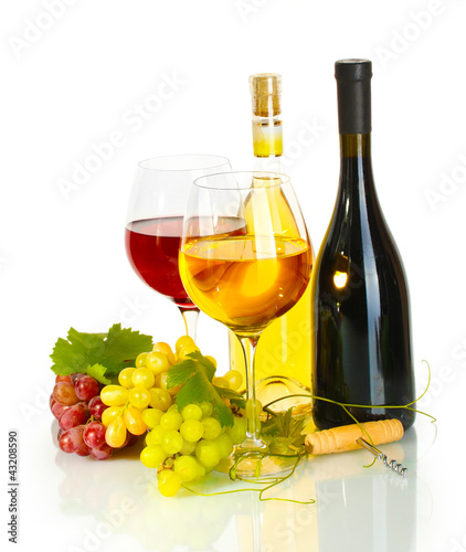 bottles and glasses of wine and ripe grapes isolated on white