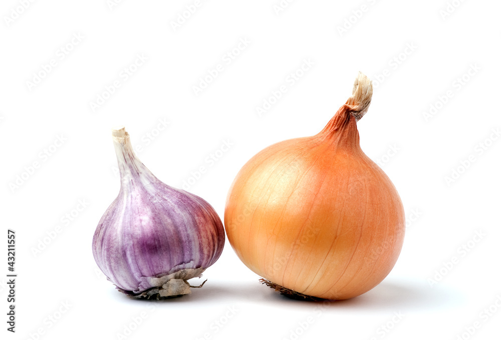 Garlic and onion bulbs on white background