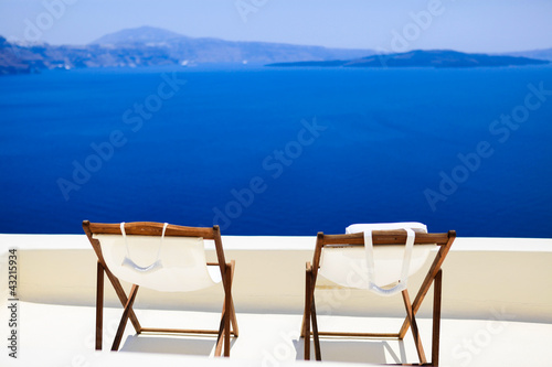 Fototapeta Naklejka Na Ścianę i Meble -  Very romantic view for couple, Santorini, Greece