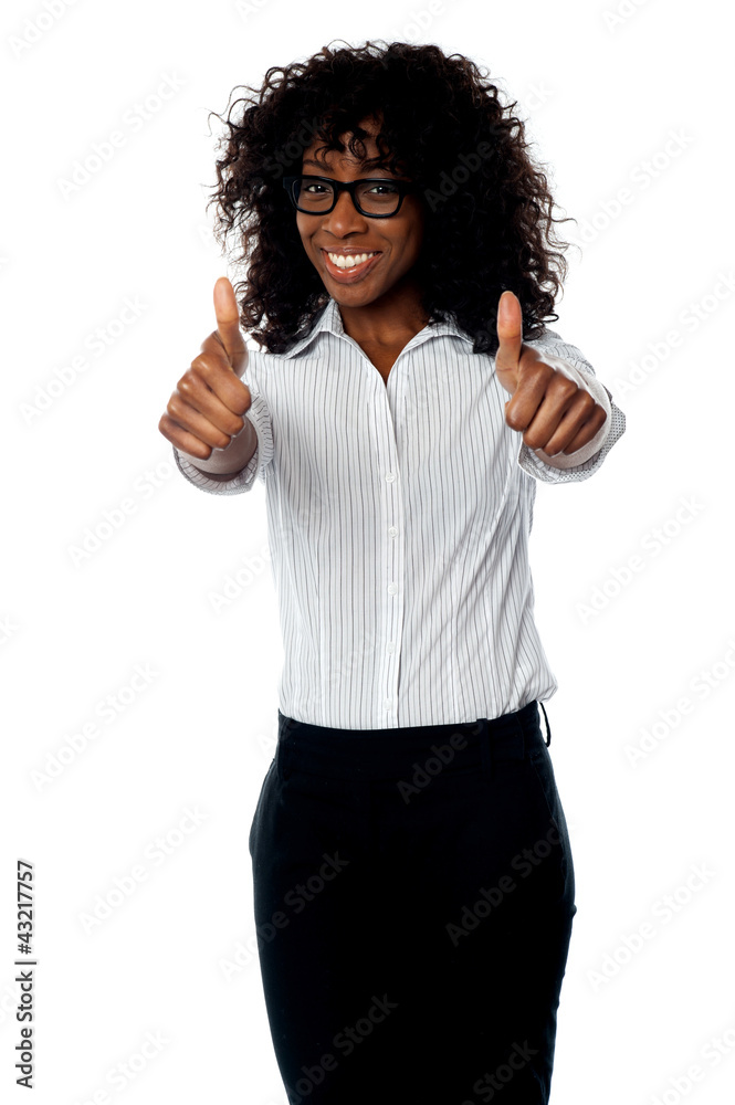 Corporate woman gesturing double thumbs up Corporate woman gesturing double thumbs up