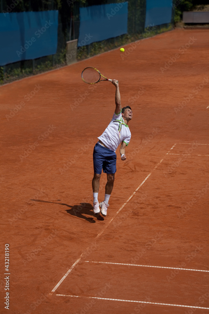 tennis player at the service