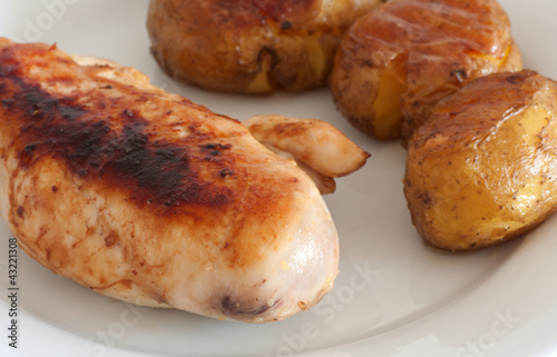 Roast chicken and baked potatoes