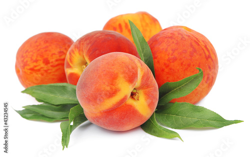 Sweet peaches with leafs photo